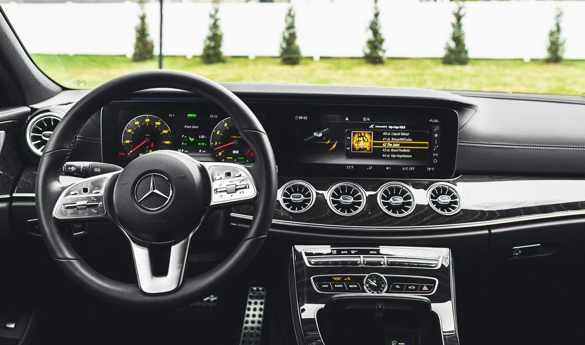 black and gray car steering wheel